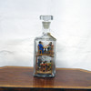 Bottle with wooden characters